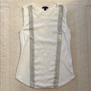 Elegant White Sleeveless Top with Silver Accents